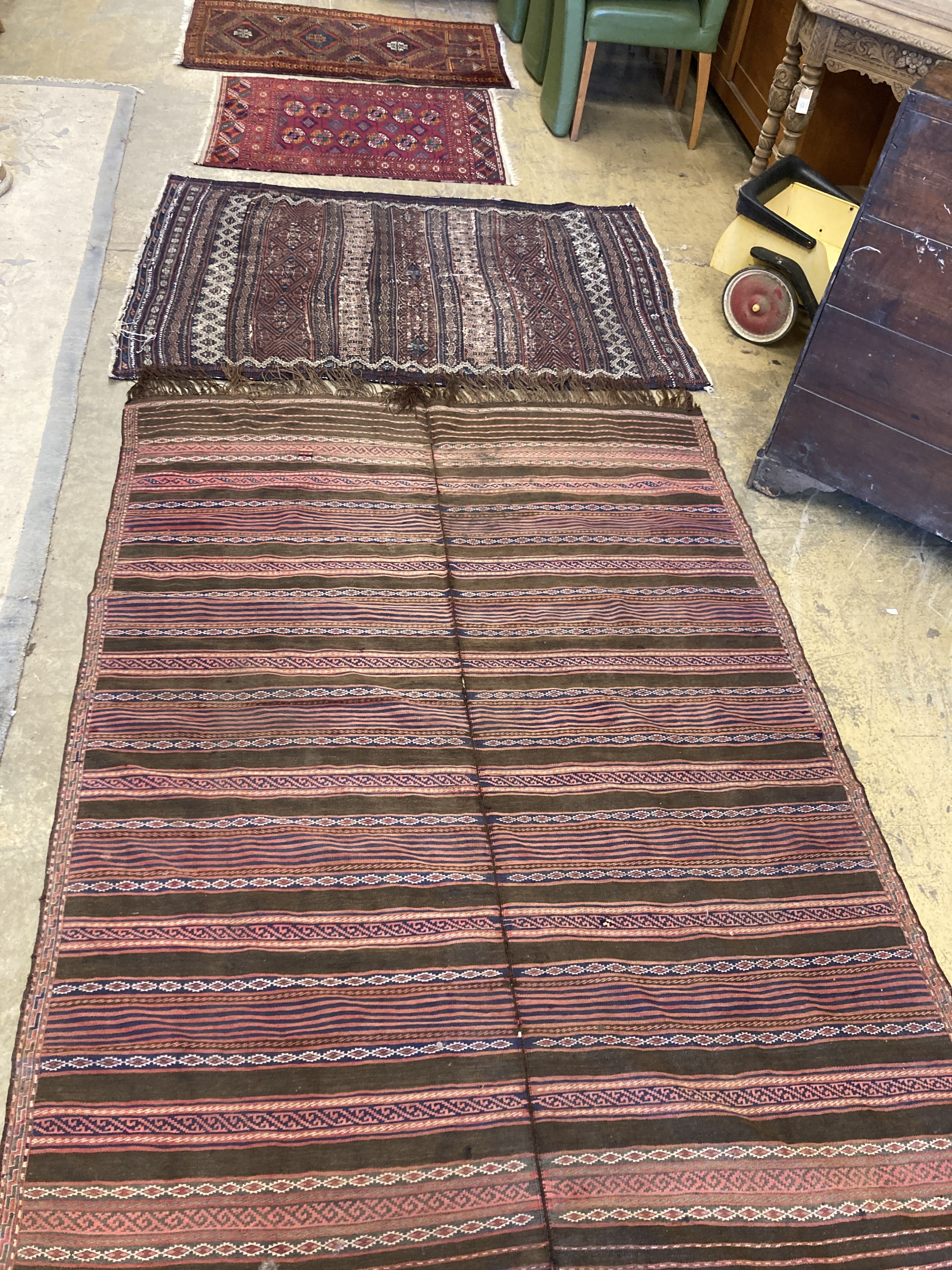 Two early 20th century flatweave rugs, a Bokhara rug and a Belouch rug, largest 220 x 160cm